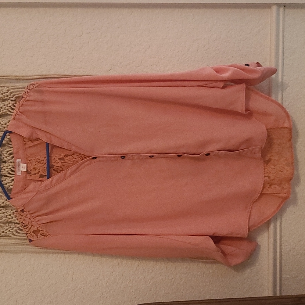 Silky button down with lace back.